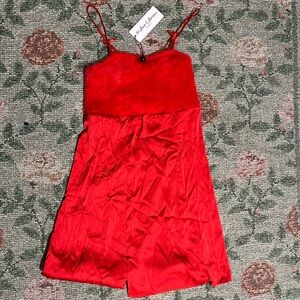 Stunning for love & lemons holiday red mini satin dress with bow details❤️
NWT
